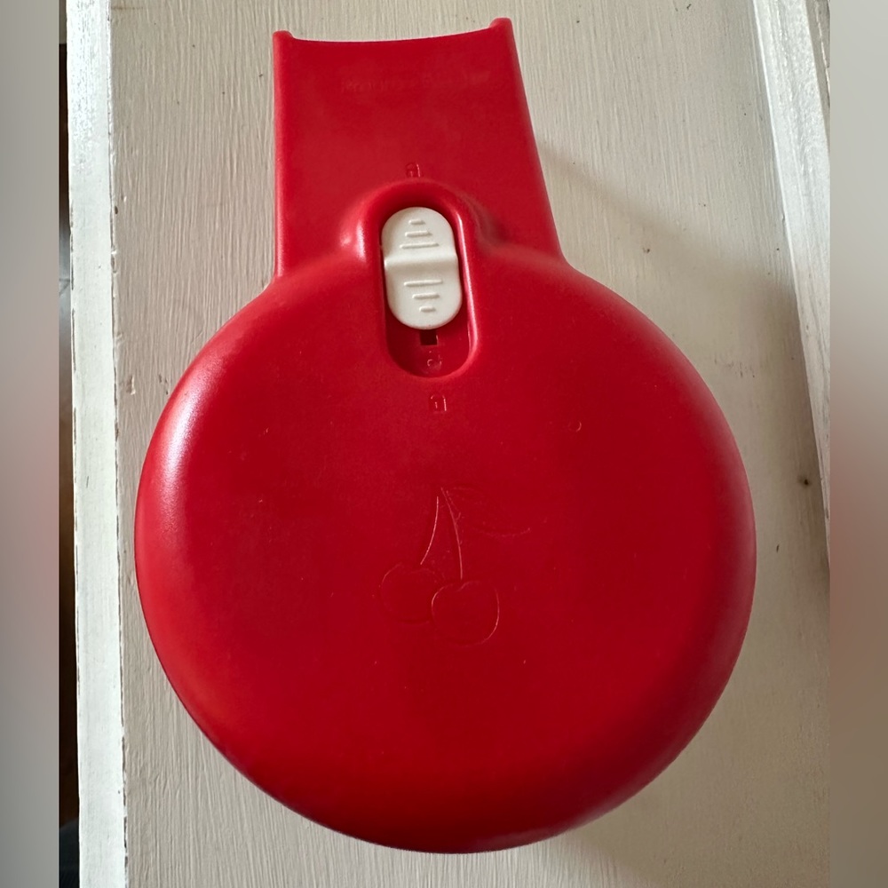 Progressive cherry pitter